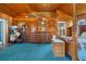 The primary bedroom suite features wood paneling, vaulted ceilings, and a spacious layout at 7235 Maryland Ave, Hudson, FL 34667