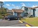 Charming condo featuring a private entrance, well-kept landscaping, and convenient parking at 7546 St Andrews Blvd, Weeki Wachee, FL 34613