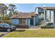Charming townhouse featuring a well-maintained lawn and neatly trimmed shrubbery at 7546 St Andrews Blvd, Weeki Wachee, FL 34613