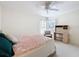 Comfortable bedroom with soft carpet, neutral walls and a small desk by a bright window at 8447 Pavilion Dr, Hudson, FL 34667