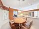 Cozy breakfast nook near kitchen with stainless steel appliances and ample cabinets at 8447 Pavilion Dr, Hudson, FL 34667