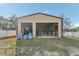 Spacious detached garage/workshop with two garage doors and ample storage space at 13083 Jaywalk Rd, Brooksville, FL 34614