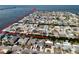 Community aerial view showing the canal-front neighborhood with easy access to the open bay at 13603 Jennita Dr, Hudson, FL 34667