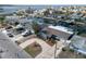 Aerial view showcasing the waterfront neighborhood with private boat docks and canal access at 13603 Jennita Dr, Hudson, FL 34667