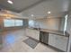 Open kitchen with a large island, stainless steel appliances, and ample counter space for cooking at 13603 Jennita Dr, Hudson, FL 34667