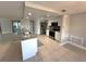 Spacious kitchen featuring stainless steel appliances, granite countertops, and modern cabinetry at 13603 Jennita Dr, Hudson, FL 34667