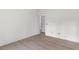 Bedroom featuring light colored wood floors and white walls at 18020 Macek Rd, Weeki Wachee, FL 34614