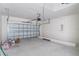 Spacious two car garage, equipped with an automatic door opener and ample storage space at 18020 Macek Rd, Weeki Wachee, FL 34614
