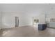 Bright and airy living space featuring an open floor plan and stylish kitchen island at 18020 Macek Rd, Weeki Wachee, FL 34614