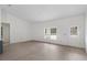 Bright and airy living space featuring an open floor plan and lots of natural light at 18020 Macek Rd, Weeki Wachee, FL 34614