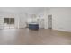 Bright and airy living space featuring an open floor plan and stylish kitchen island at 18020 Macek Rd, Weeki Wachee, FL 34614