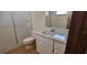 Bathroom featuring a shower and a sink with marble at 2013 Meredith Dr, Spring Hill, FL 34608