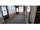 The sunroom has sliding doors that lead out to the backyard at 2013 Meredith Dr, Spring Hill, FL 34608