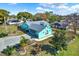 Expansive property featuring lush landscaping, a long driveway and mature trees at 2334 Gimlet, Spring Hill, FL 34608