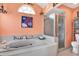 Bathroom featuring soaking tub and glass-enclosed shower at 2334 Gimlet, Spring Hill, FL 34608