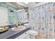 Charming bathroom with seashell theme decor and a neutral-toned countertop sink at 2334 Gimlet, Spring Hill, FL 34608