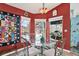 Cozy dining area with views of the pool, adjacent to a kitchen with a unique design at 2334 Gimlet, Spring Hill, FL 34608