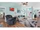 Bright living room boasts a vaulted ceiling and ample natural light creating a cozy and inviting atmosphere at 2334 Gimlet, Spring Hill, FL 34608