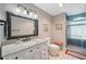 Updated bathroom features modern vanity, and tiled shower at 2862 Lomond Dr, Palm Harbor, FL 34684