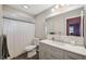 Bathroom features modern vanity, toilet, and shower/tub combo at 2862 Lomond Dr, Palm Harbor, FL 34684