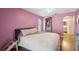 Relaxing bedroom provides hardwood floors, ceiling fan and a lot of space at 2862 Lomond Dr, Palm Harbor, FL 34684