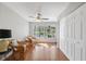 Sunroom features tile floors and a view of the pond at 2862 Lomond Dr, Palm Harbor, FL 34684