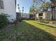 View of a well-manicured lawn and landscaping around a condominium complex at 2971 Estancia Blvd # 310, Clearwater, FL 33761