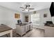 Office space featuring a large desk, natural light from window, and wood flooring at 4603 Lake In The Woods Dr, Spring Hill, FL 34607