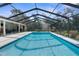 Stunning screened pool with lots of room for entertaining and relaxation at 4603 Lake In The Woods Dr, Spring Hill, FL 34607