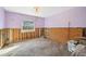 Empty bedroom ready for renovation with a large window at 4929 Avery Rd, New Port Richey, FL 34652