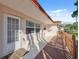 Exterior view showing white house with a red tiled roof and a wooden ramp at 4929 Avery Rd, New Port Richey, FL 34652