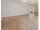 Bright, airy living room with tiled floors and ample natural light at 4929 Avery Rd, New Port Richey, FL 34652
