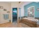 Bright bathroom featuring a glass enclosed shower and a large tub with tile accents at 5351 Championship Cup Ln, Spring Hill, FL 34609