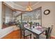 Dining area with bay window featuring lots of natural light and views of the backyard at 5351 Championship Cup Ln, Spring Hill, FL 34609