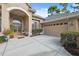 Charming single-story home with a well-manicured yard and an attached two-car garage at 5351 Championship Cup Ln, Spring Hill, FL 34609