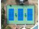 An aerial view of the community tennis courts that are fenced and well-lit at 5351 Championship Cup Ln, Spring Hill, FL 34609