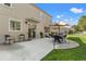 Outdoor space with covered patio featuring a dining area and comfortable seating, ideal for gatherings and leisure at 5412 Hammock View Ln, Apollo Beach, FL 33572