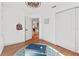 Bright bedroom featuring built in closet and a decorative rug at 5412 Hammock View Ln, Apollo Beach, FL 33572