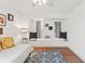Bright bedroom featuring a window nook and blue patterned rug at 5412 Hammock View Ln, Apollo Beach, FL 33572