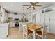 Updated kitchen with stainless steel appliances, wine rack, pendant lights, and a breakfast bar at 5412 Hammock View Ln, Apollo Beach, FL 33572
