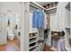 Well-organized walk-in closet with built-in shelves and hanging storage at 5412 Hammock View Ln, Apollo Beach, FL 33572
