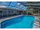 Enjoy this in-ground pool with screened enclosure connected to the house at 6495 Fairlawn St, Spring Hill, FL 34606