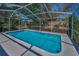 Enjoy this in-ground pool with screened enclosure and plenty of space to entertain at 6495 Fairlawn St, Spring Hill, FL 34606