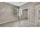 The modern bedroom has wood floors, a mirrored closet, and a window for lots of sunlight at 7399 Skylark Dr, Spring Hill, FL 34606