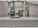 Close up kitchen view with stainless appliances, and large center island at 7399 Skylark Dr, Spring Hill, FL 34606