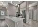 Modern kitchen featuring a center island, stainless steel appliances, and sleek design at 7399 Skylark Dr, Spring Hill, FL 34606