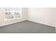 Bright bedroom featuring neutral walls and plush carpet at 7552 Gardner St, Brooksville, FL 34613