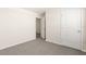 Bright bedroom featuring neutral walls and plush carpet at 7552 Gardner St, Brooksville, FL 34613