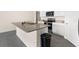 Well-lit kitchen featuring a kitchen island, stainless steel appliances, and plenty of counter space at 7552 Gardner St, Brooksville, FL 34613