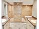 Dual sink vanity, a tiled shower and soaking tub create a spa-like experience at 8055 River Country Dr, Weeki Wachee, FL 34607